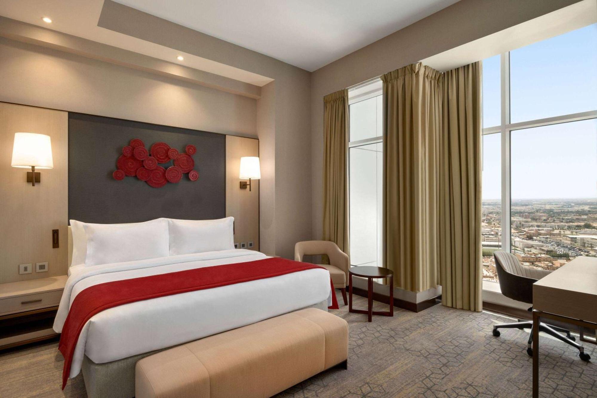 Ramada By Wyndham Riyadh King Fahd Road Dış mekan fotoğraf A bedroom at the hotel